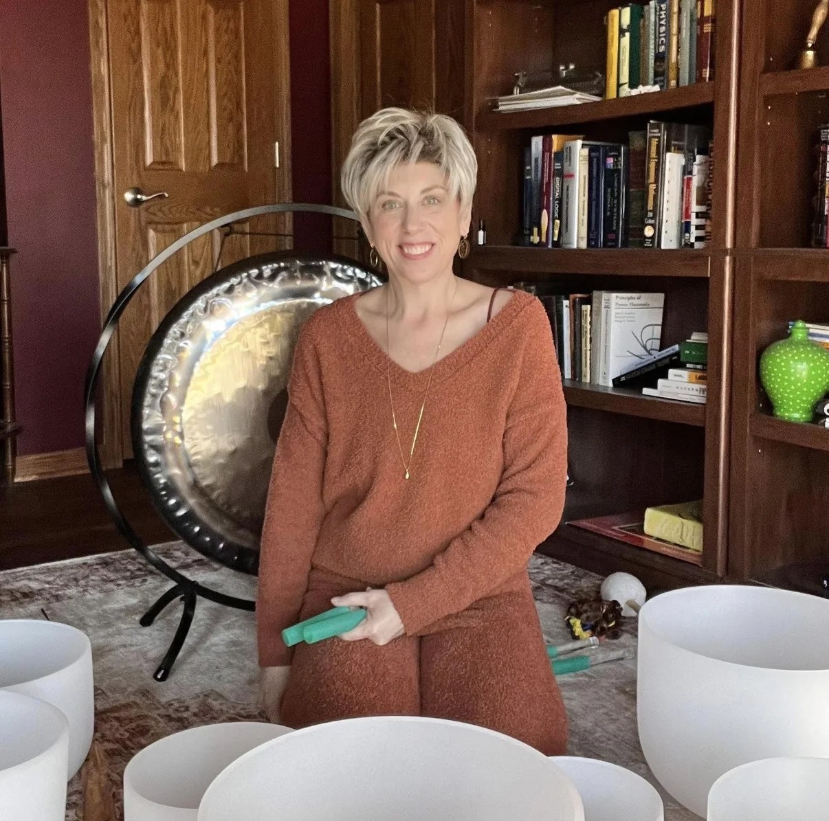 Shannon L. Kingery with her gong and crystal singing bowls